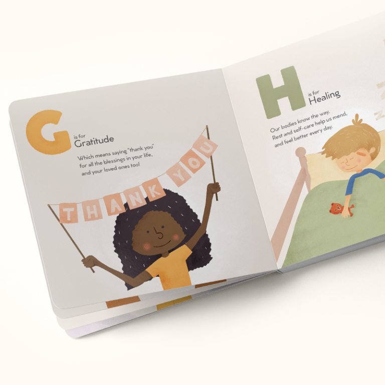The book open to G, for Gratitude, with a child holding a thank-you banner, and H, for Healing, with a child resting in bed